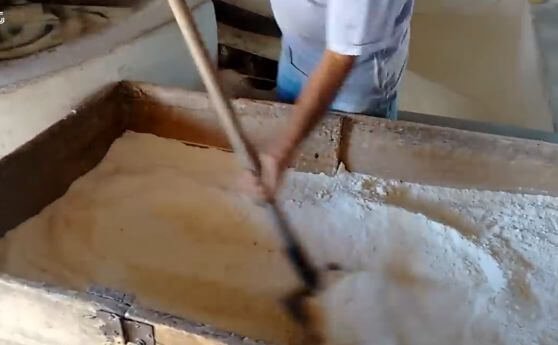 Milled yuca flour waiting to be sieved - how to produce cassava flour