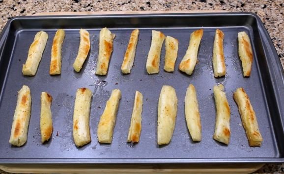 Baked yuca fries in the baking pan