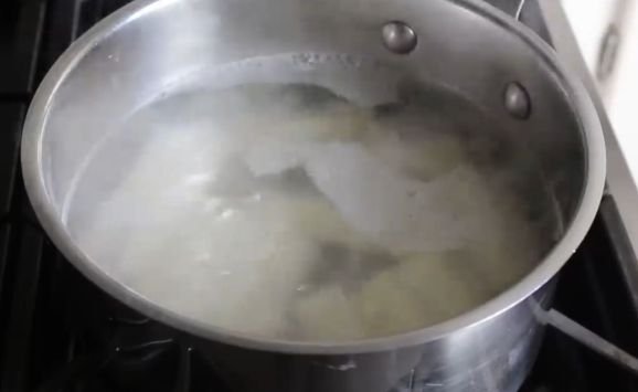 Boiling yuca for yuca fries