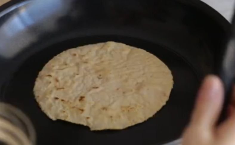 Heat the flattened tortillas dough front and back a minute each to have your cassava flour tortillas