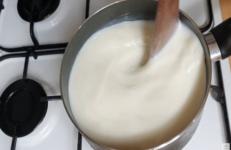 Stirring the mixture on low heat continuously to avoid sticking
