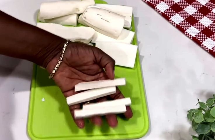 Cutting cassava roots into the needed sizes for cassava fries