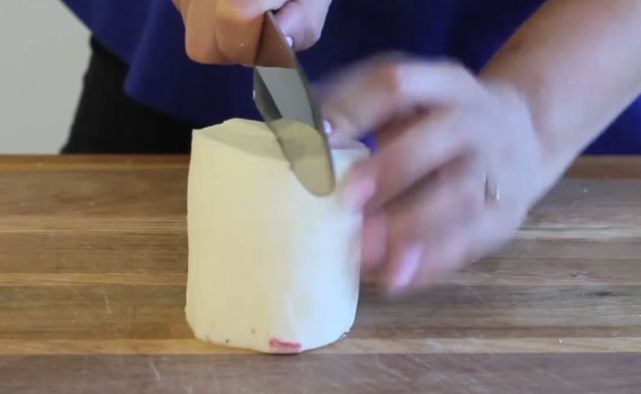 chopping of yuca root to desired size