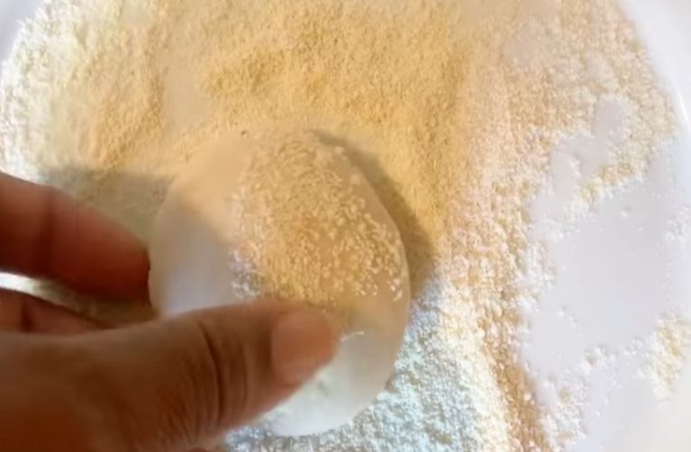 Molding the cassava for casabe bread