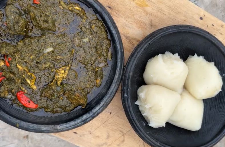 A serving of Fufu and Cassava Leaves