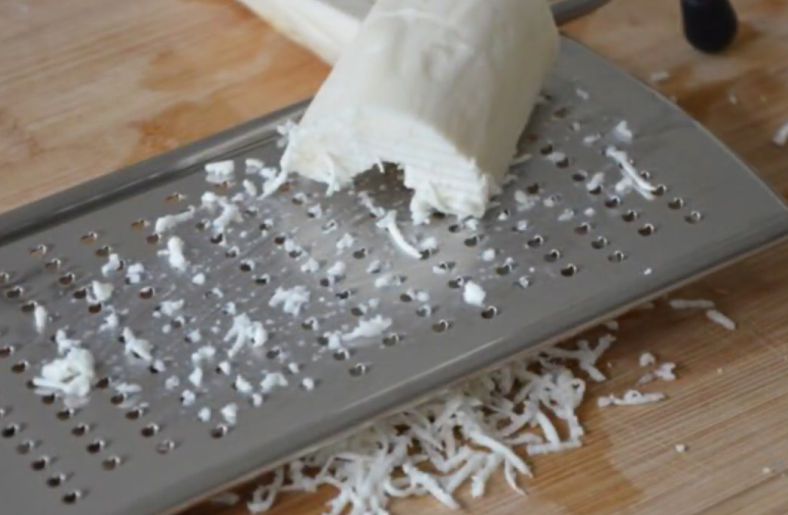 Cassava grater in action