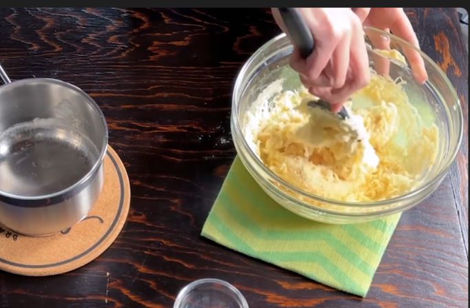 Mixing the eggs and cheese
