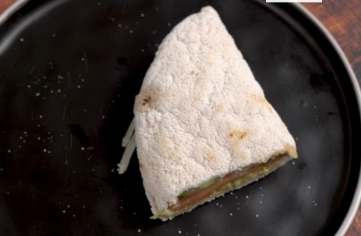 A cut Brazilian tapioca crepes