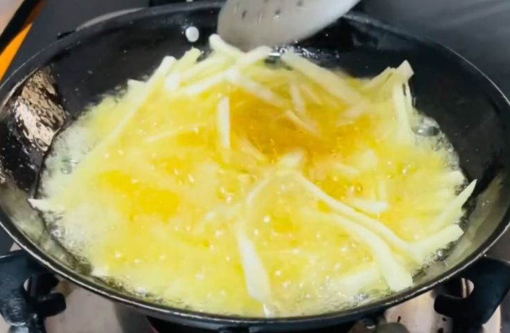Sliced tapioca chips fried in oil