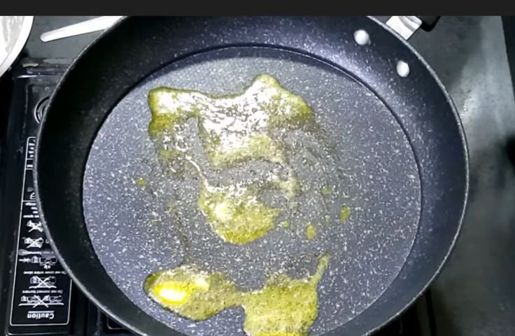 Skillet with heated butter ready to cook