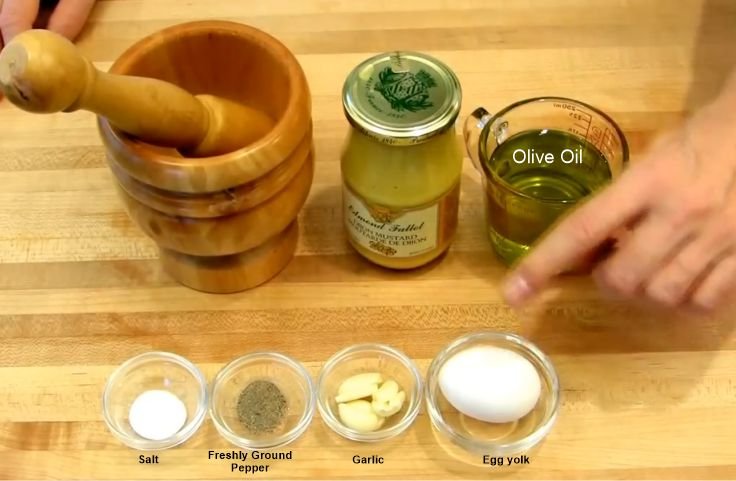 Ingredients and equipment for making yuca fries dipping sauce - garlic aioli sauce