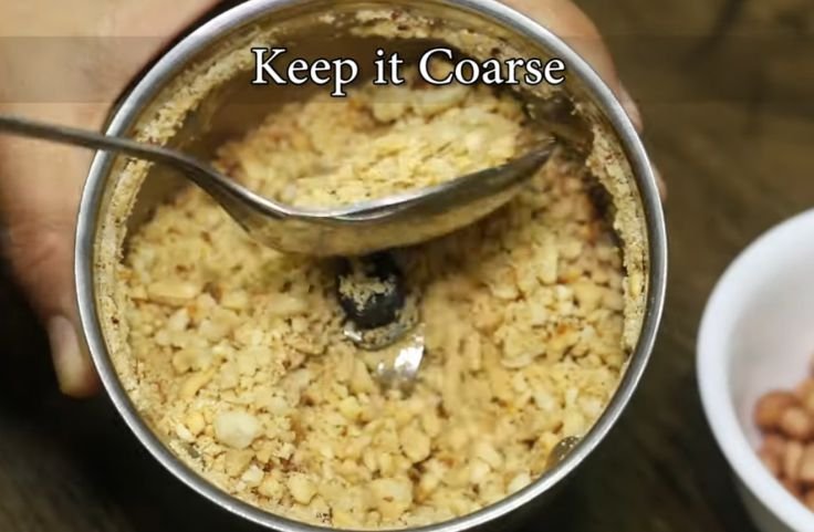 Crushing the peanuts for Sabudana Khichdi
