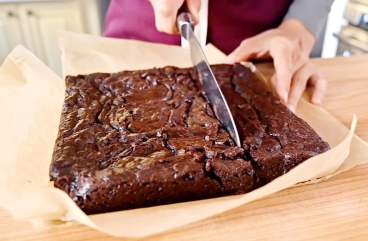 Cooled well-made vegan cassava flour brownies about to be served