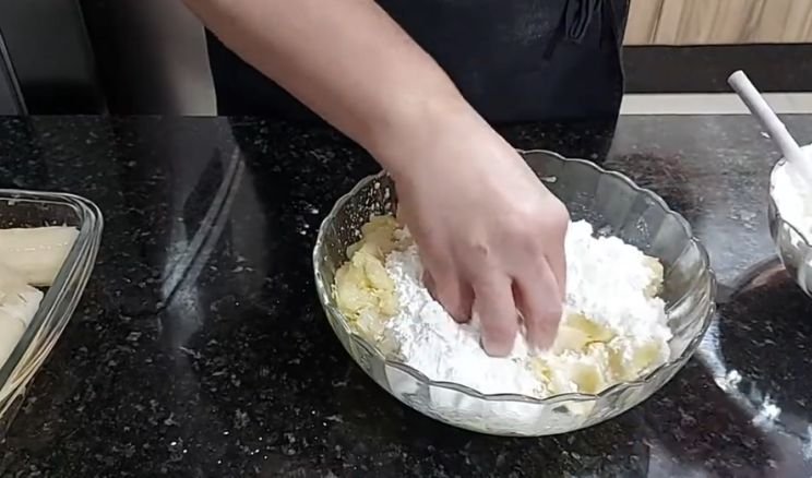 Combine the whole cassava gnocchi dough mixture with hand 