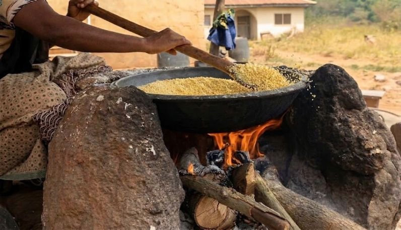 Roasting the garri on local heat